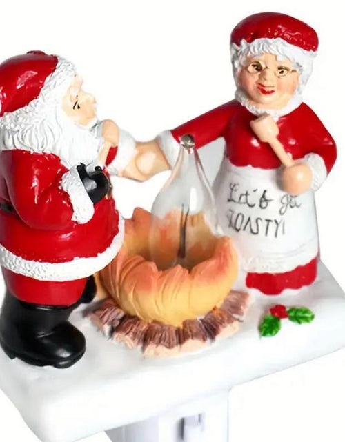 Load image into Gallery viewer, SANTA and MRS. CLAUS CAMPFIRE NIGHTLIGHT
